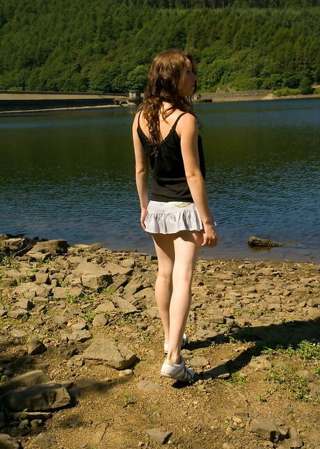 Sylphlike dark hair young Jasmine exposes her butt in nice skirt and masturbates at beach